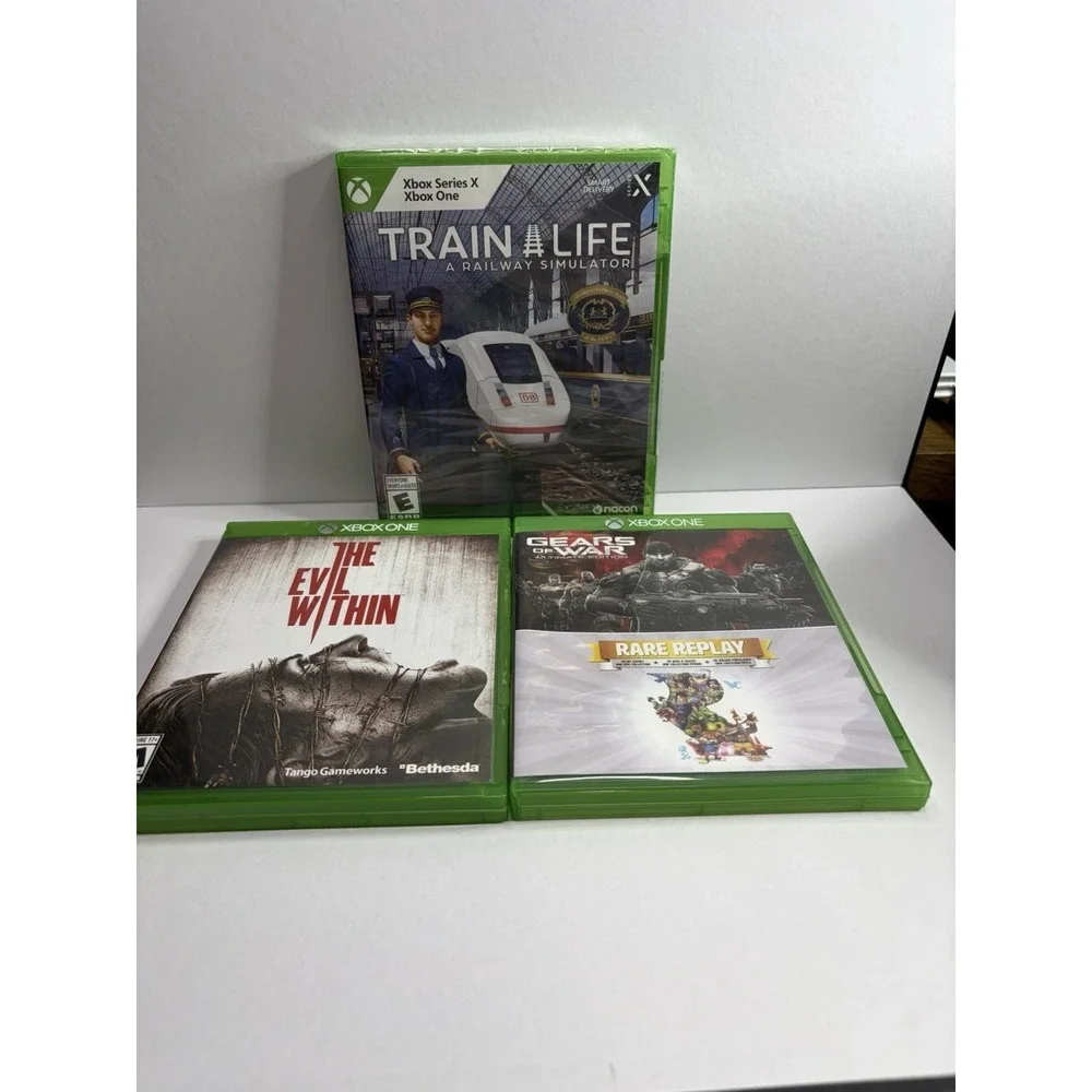 Microsoft Xbox One Game Lot Train Life Gears of War Rare Replay The Evil Within
